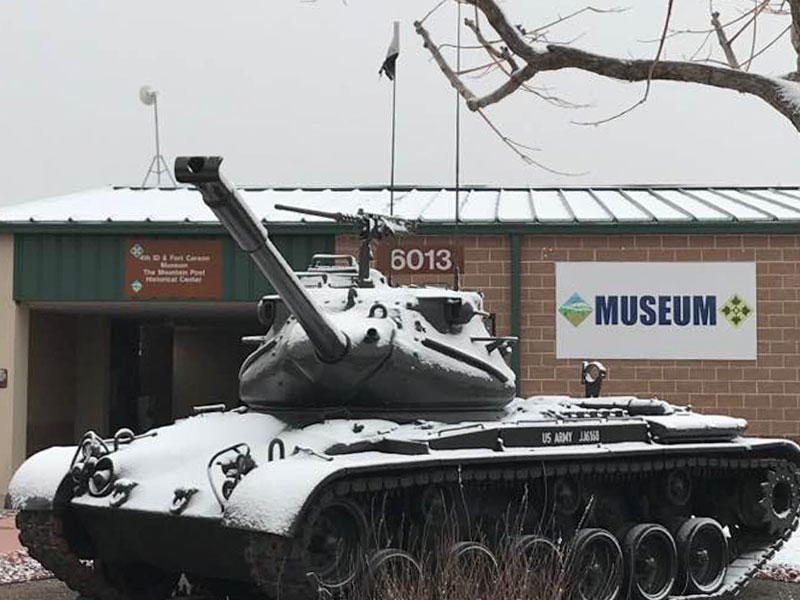 US Army tank positioned outside a museum.